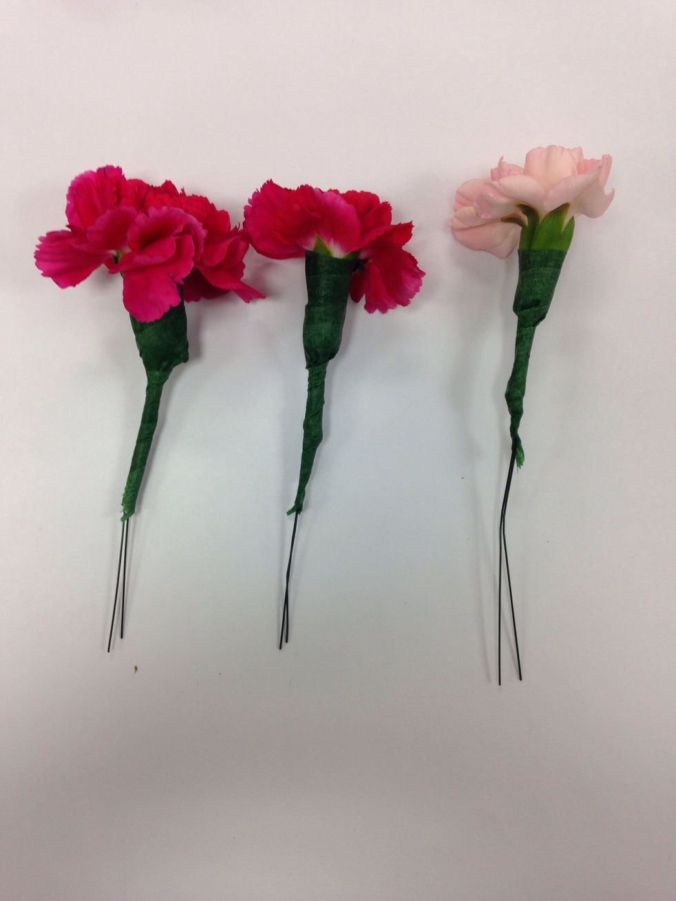 Stop the tape at the end of the stem. There should be wire leftover. This will come in handy in a later step