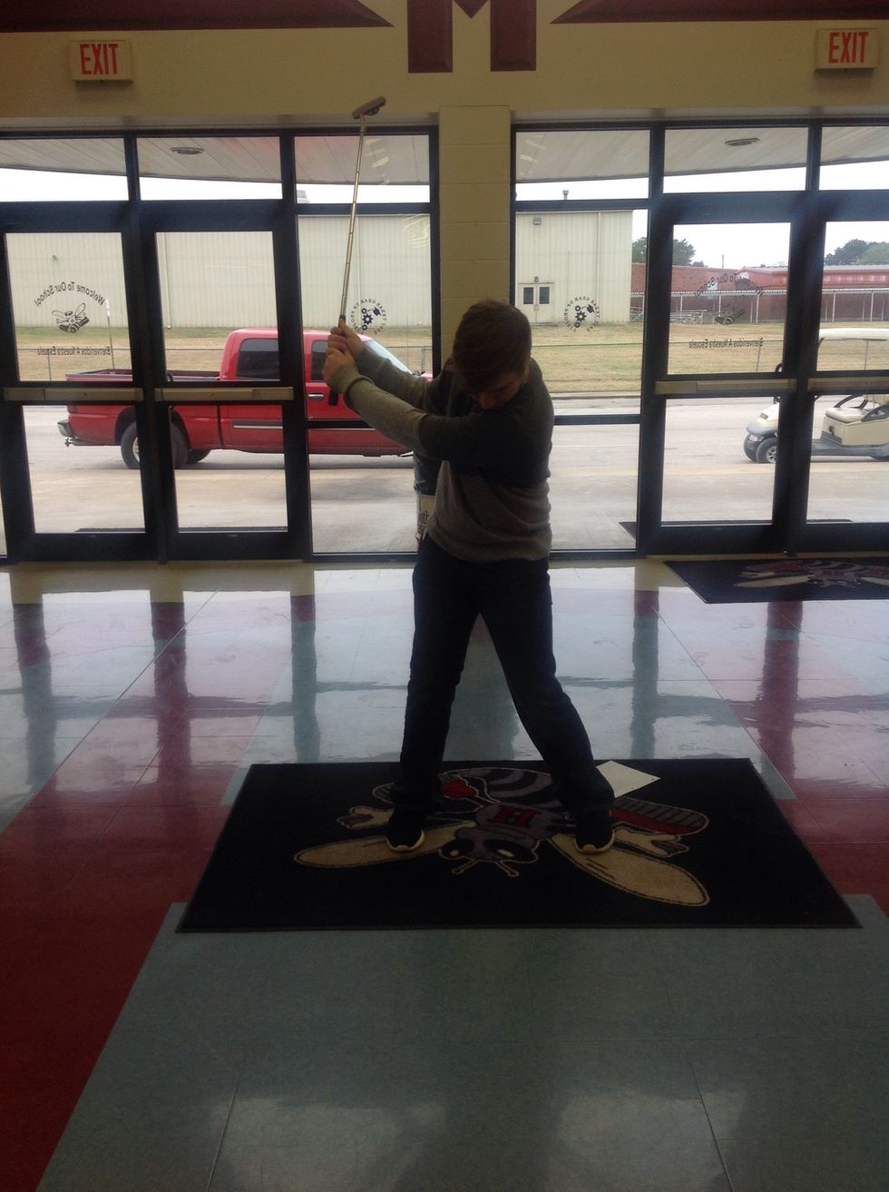 Stop when your front shoulder touches your chin