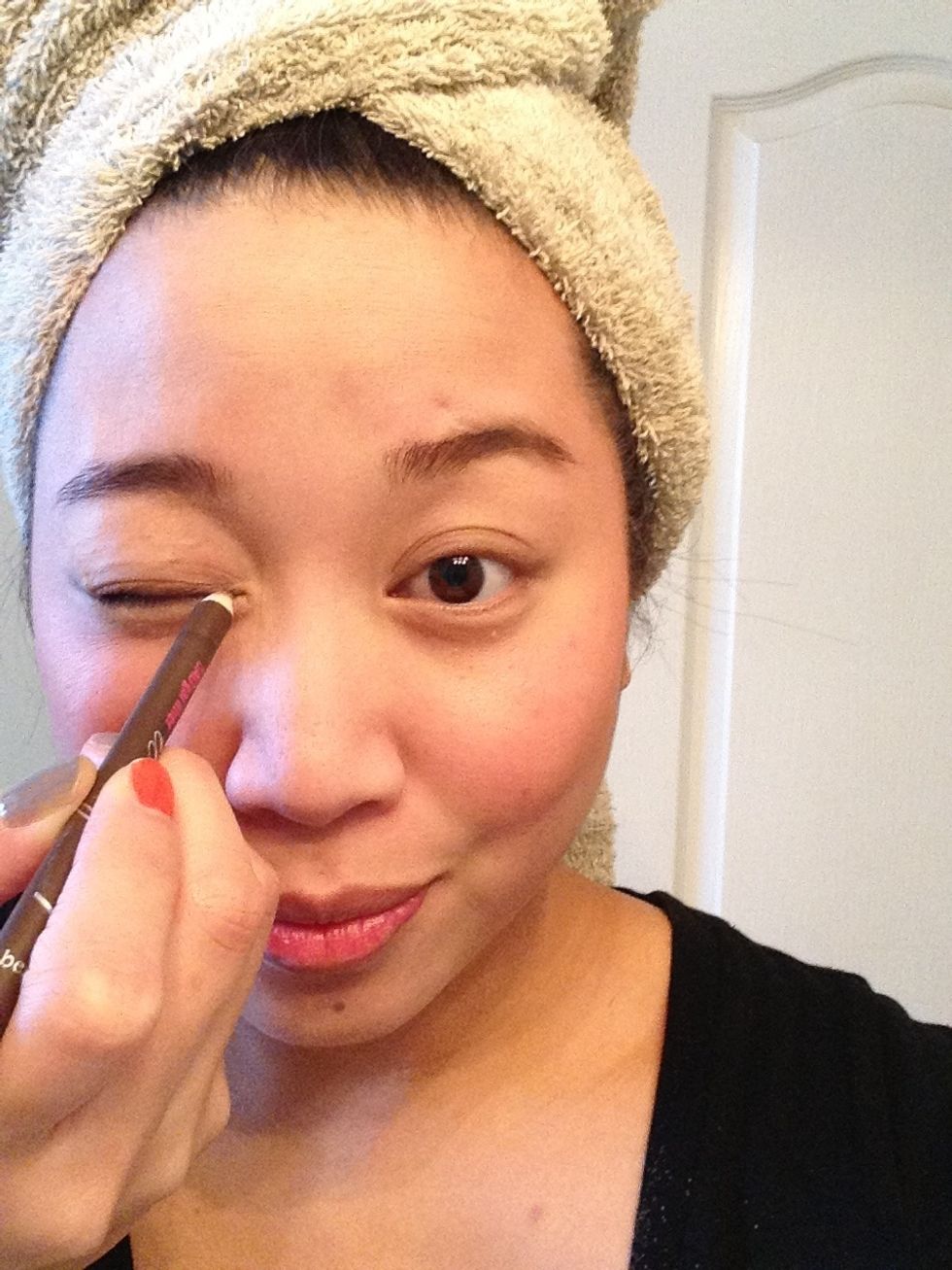 Straight across the top and smudge for a smokey effect ...