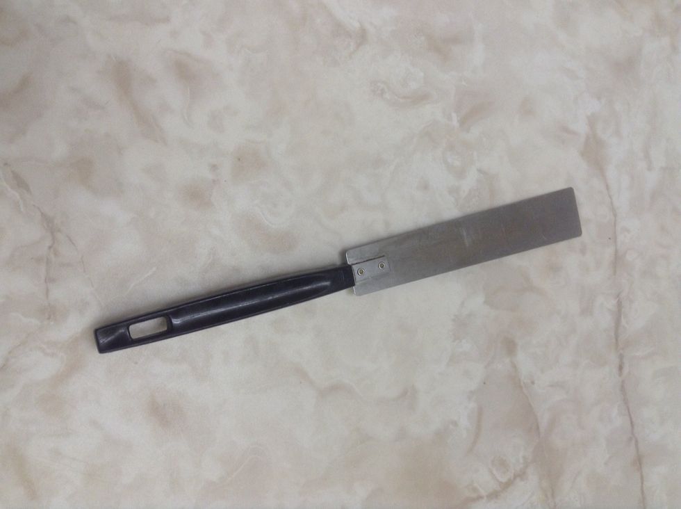 Straight Edge Spatula. Used for leveling ingredients. I can use a straight edge spatula to level the flour in a cup.