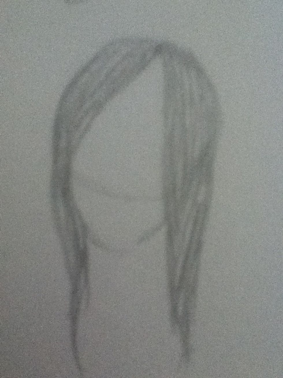 Straight hair. It lies flat on the scalp and only has slight volume.