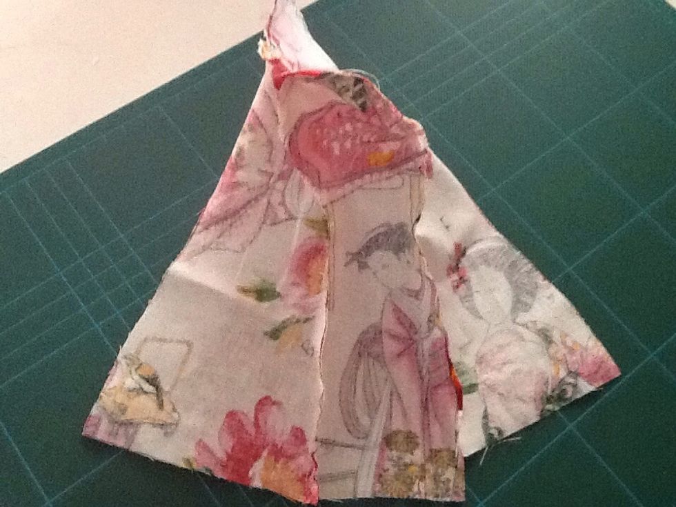 Straight stitch down both sides of the pinned areas.