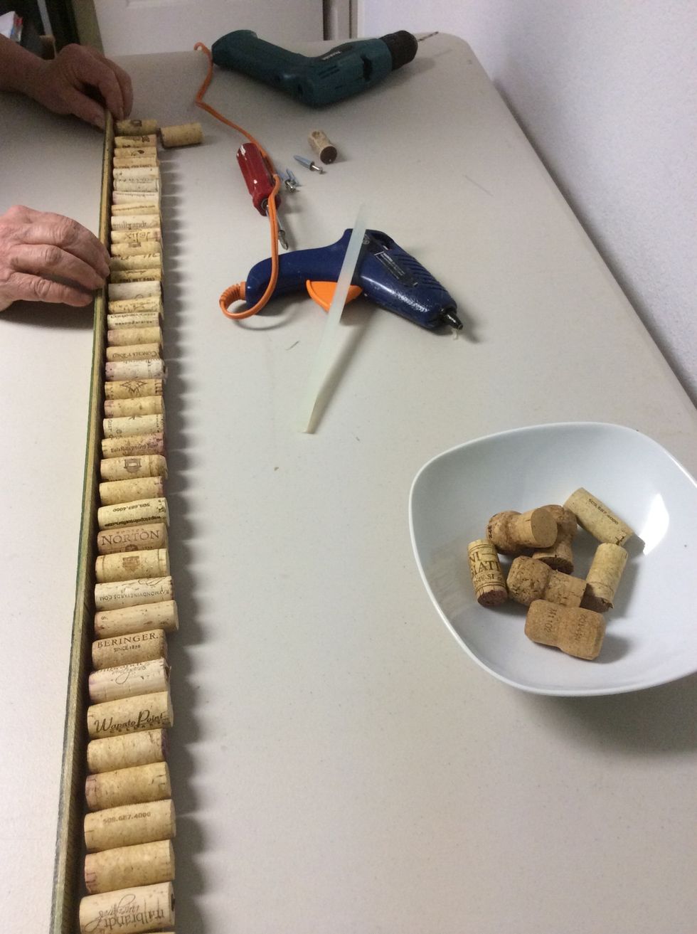 Straighten if necessary. Another yard stick works well for this.