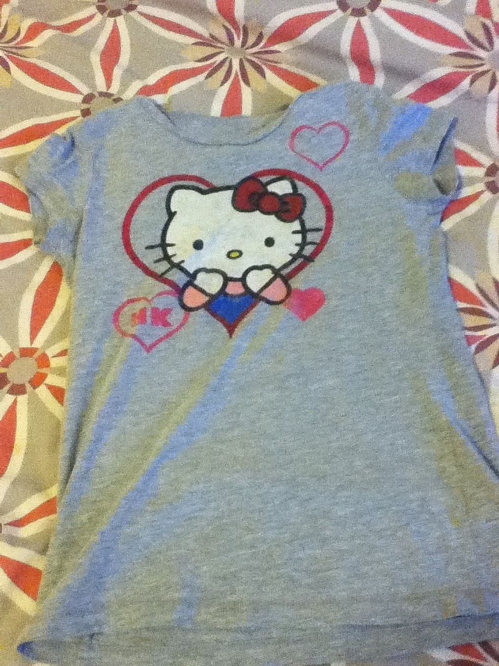 Straighten out shirt in front of you