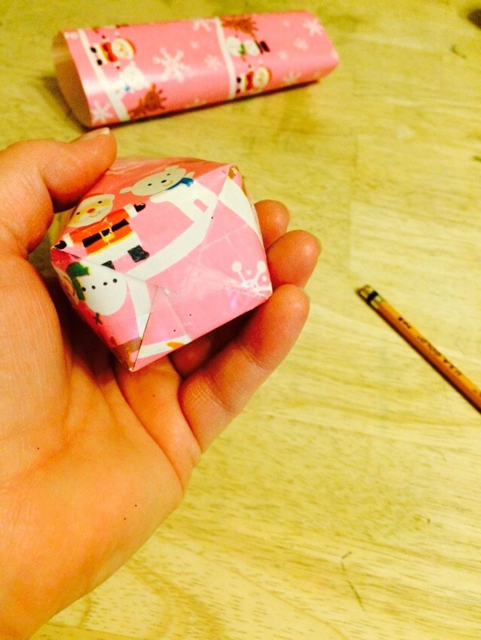 Straighten out the bottom of the bag.