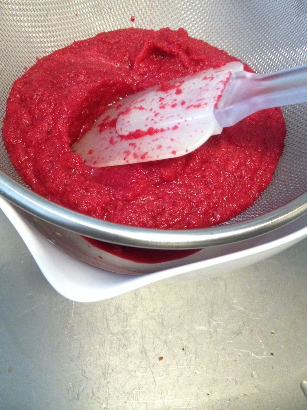 Strain a little bit at a time and discard pulp in garbage. I after I'm done I pour my juice, rinse my strainer and strain it once more to get any excess pulp.