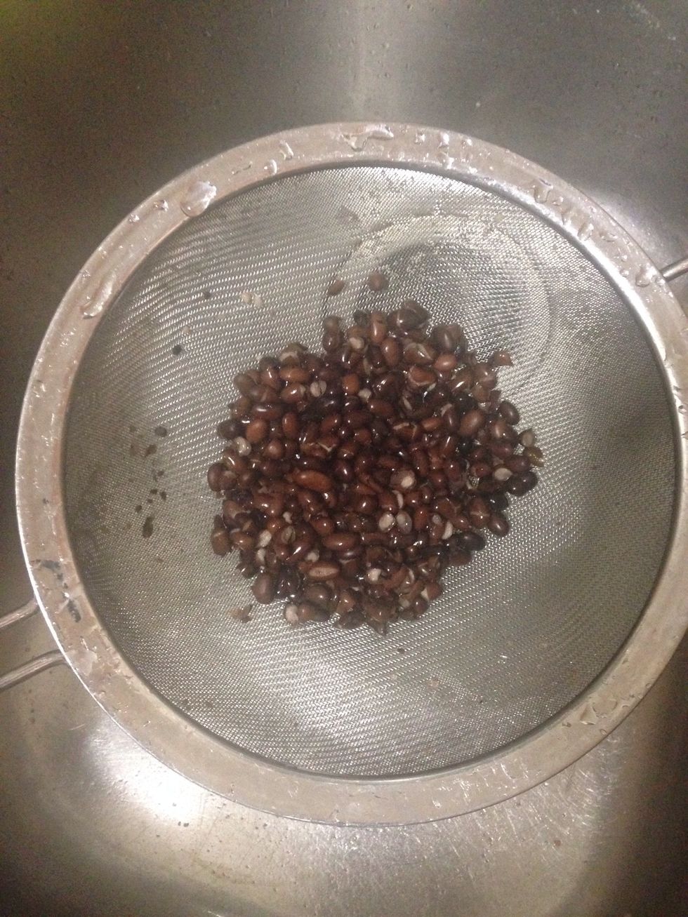 Strain and set aside for now. Keep in mind canned beans are already cooked; so if you have black beans not from a can make sure you boil them until cooked and easily "mash-able"