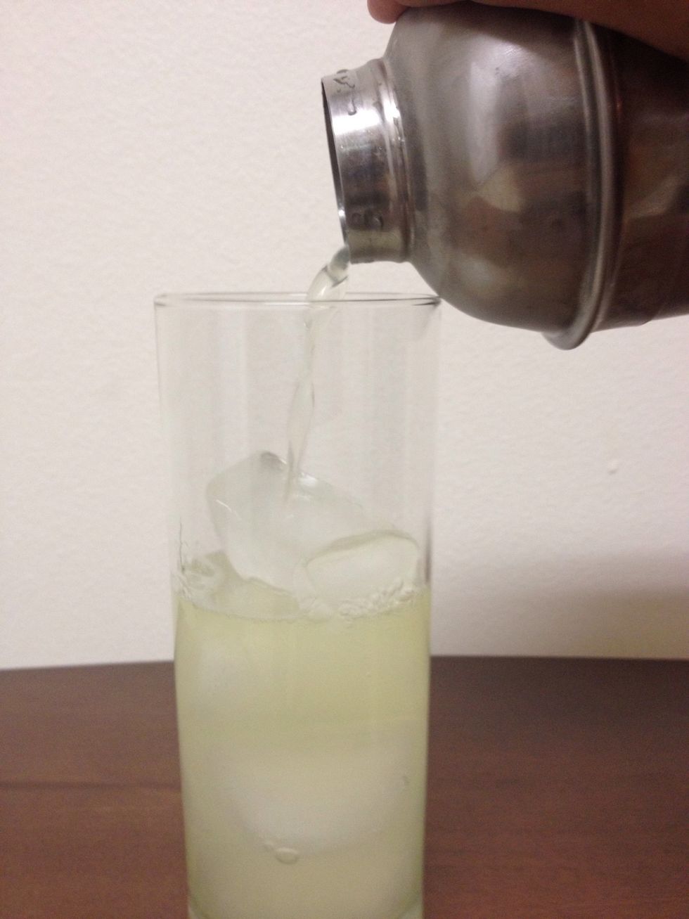 Strain contents into your Highball/Collins Glass w/ Ice!!