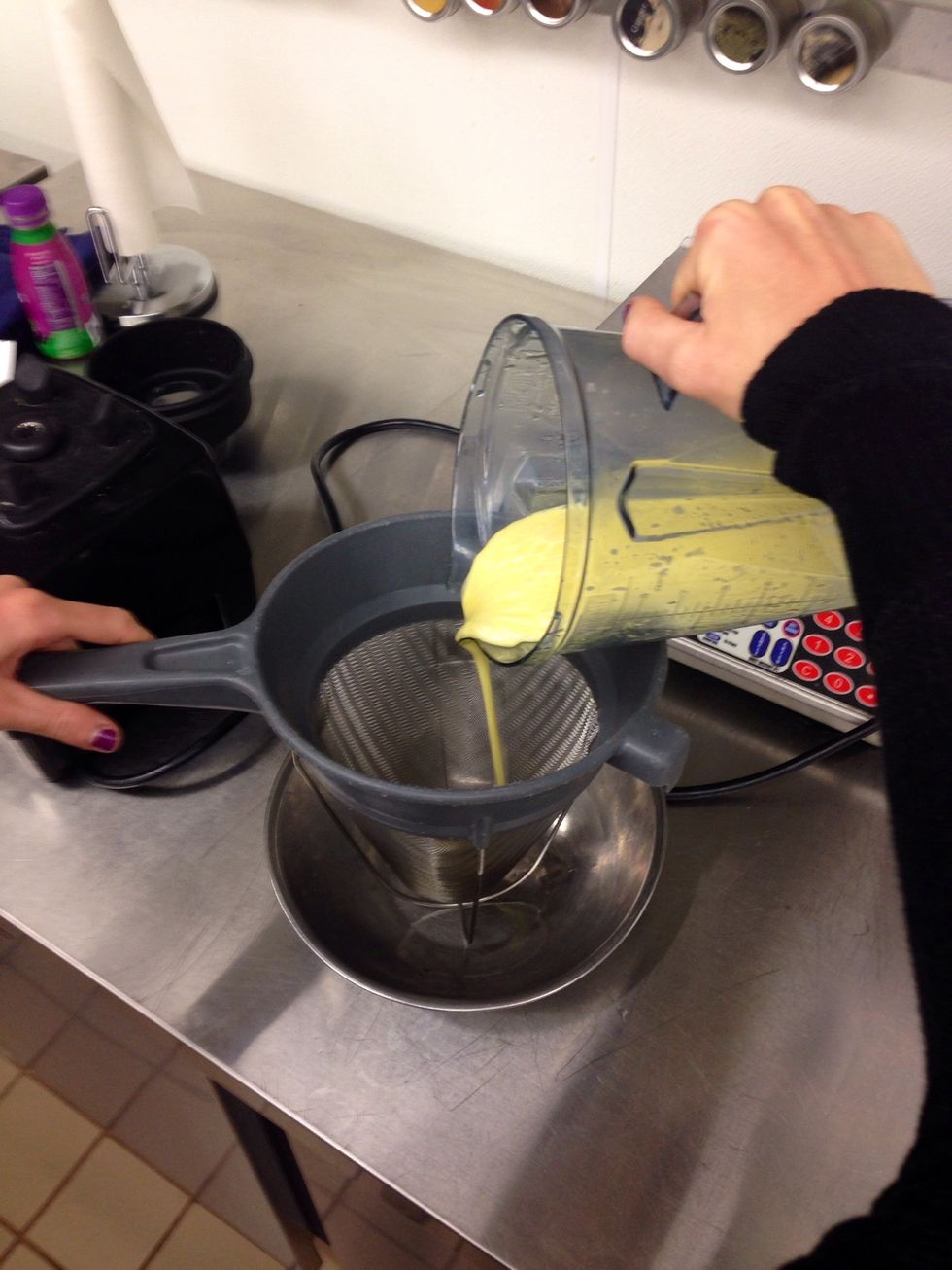 Strain curd into mixing bowl