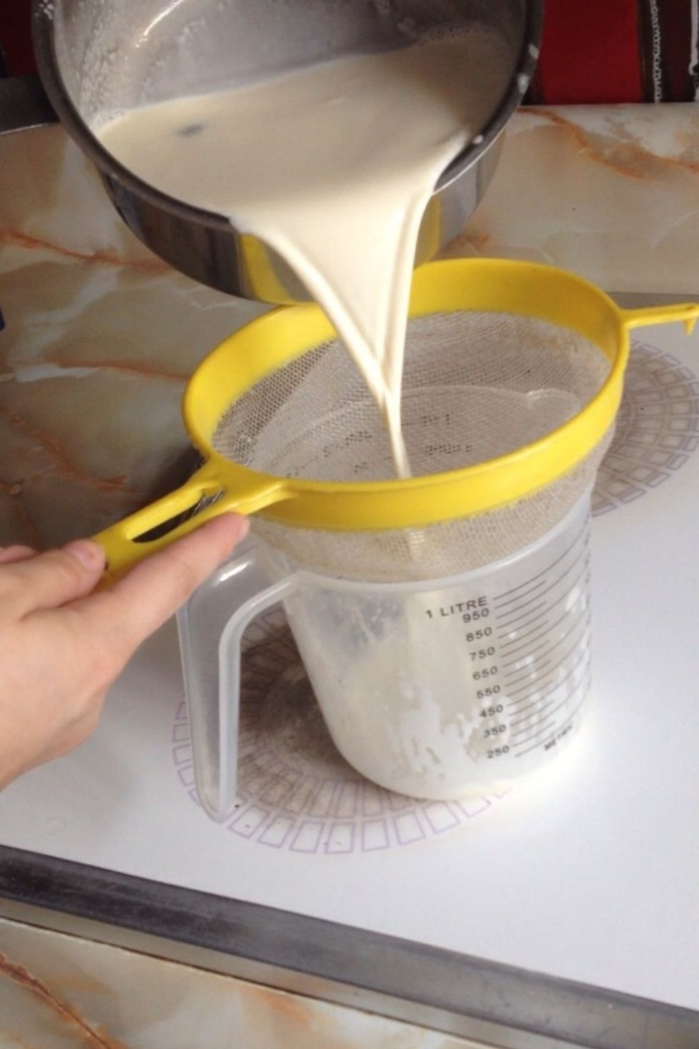 Strain it to avoid lumps of gelatine and to pick out the lemon peel