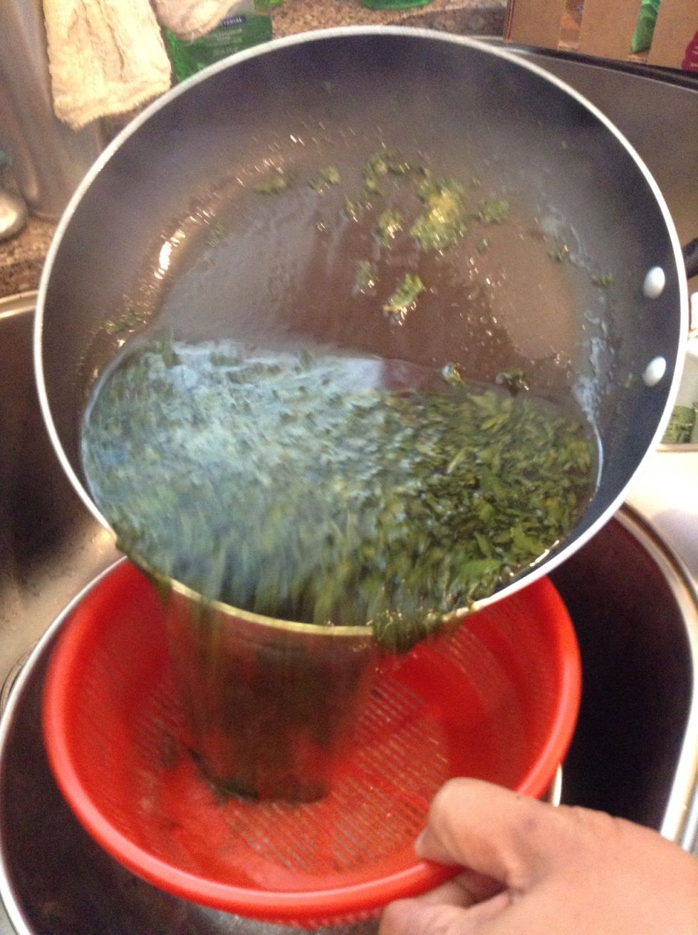 Strain mint. Let your simple syrup mixture cool while you prepare other things.