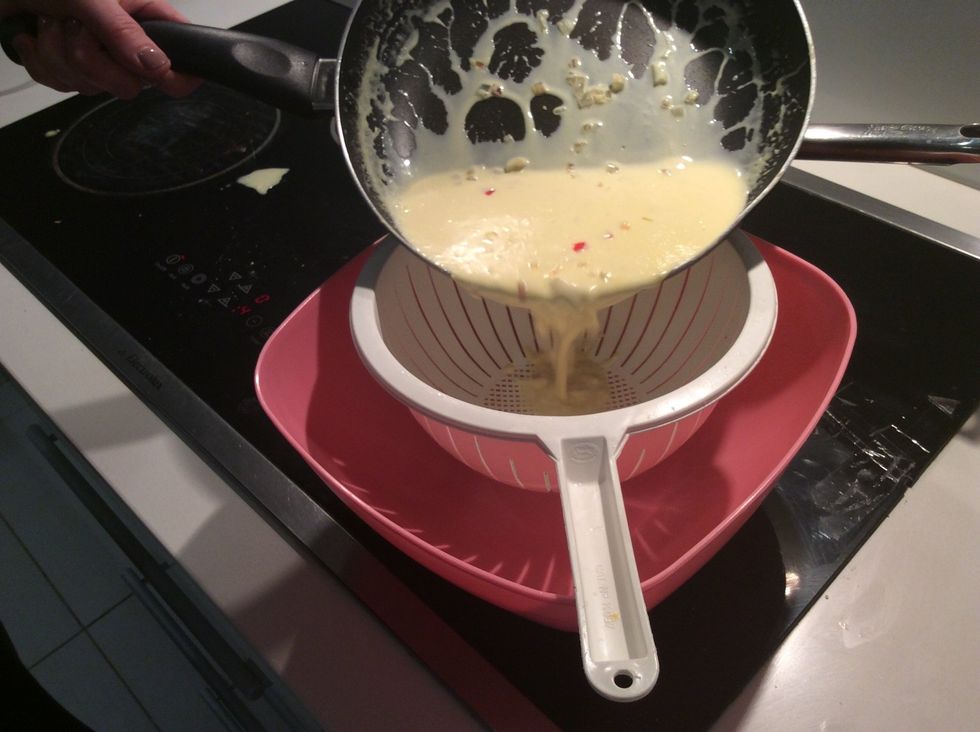 Strain sauce into bowl and whip