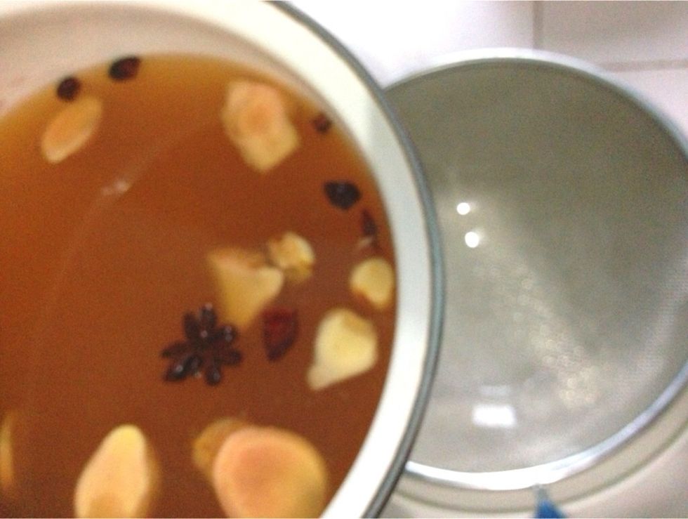 Strain syrup into medium bowl. Add in 2 cups + 3 tbsp of chilled fresh lemon juice. Reserve 1/3 cup of syrup to make the frozen yoghurt