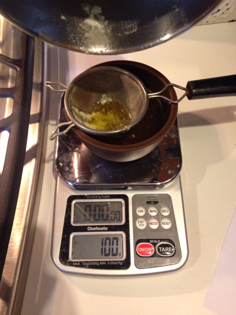 Strain the butter through a strainer or cheesecloth into a bowl and re weigh 100 grams.