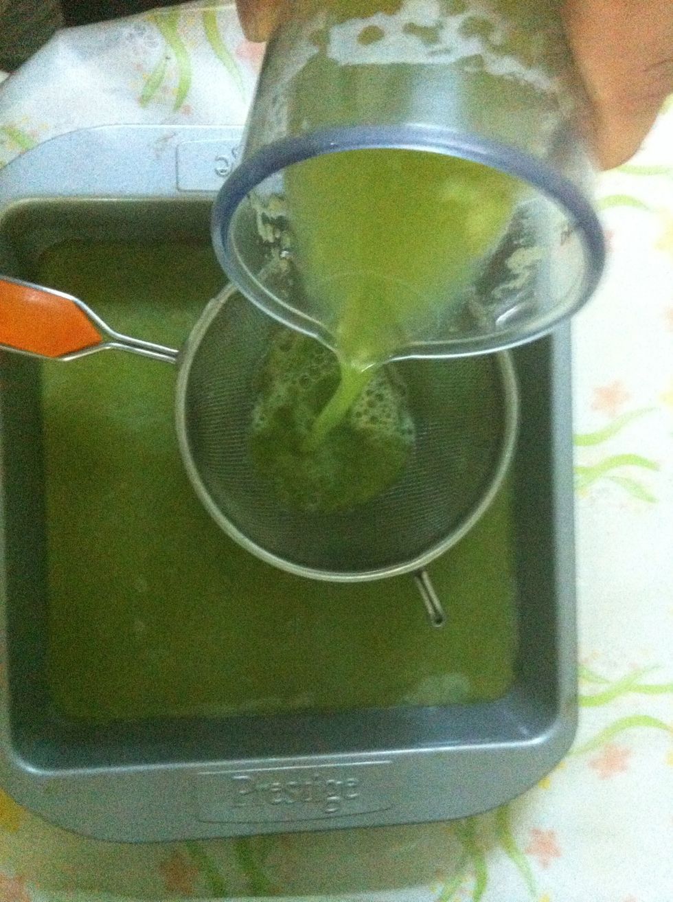 Strain the mixture onto a wide, shallow dish, I used an oven dish but feel free to use a plastic container.