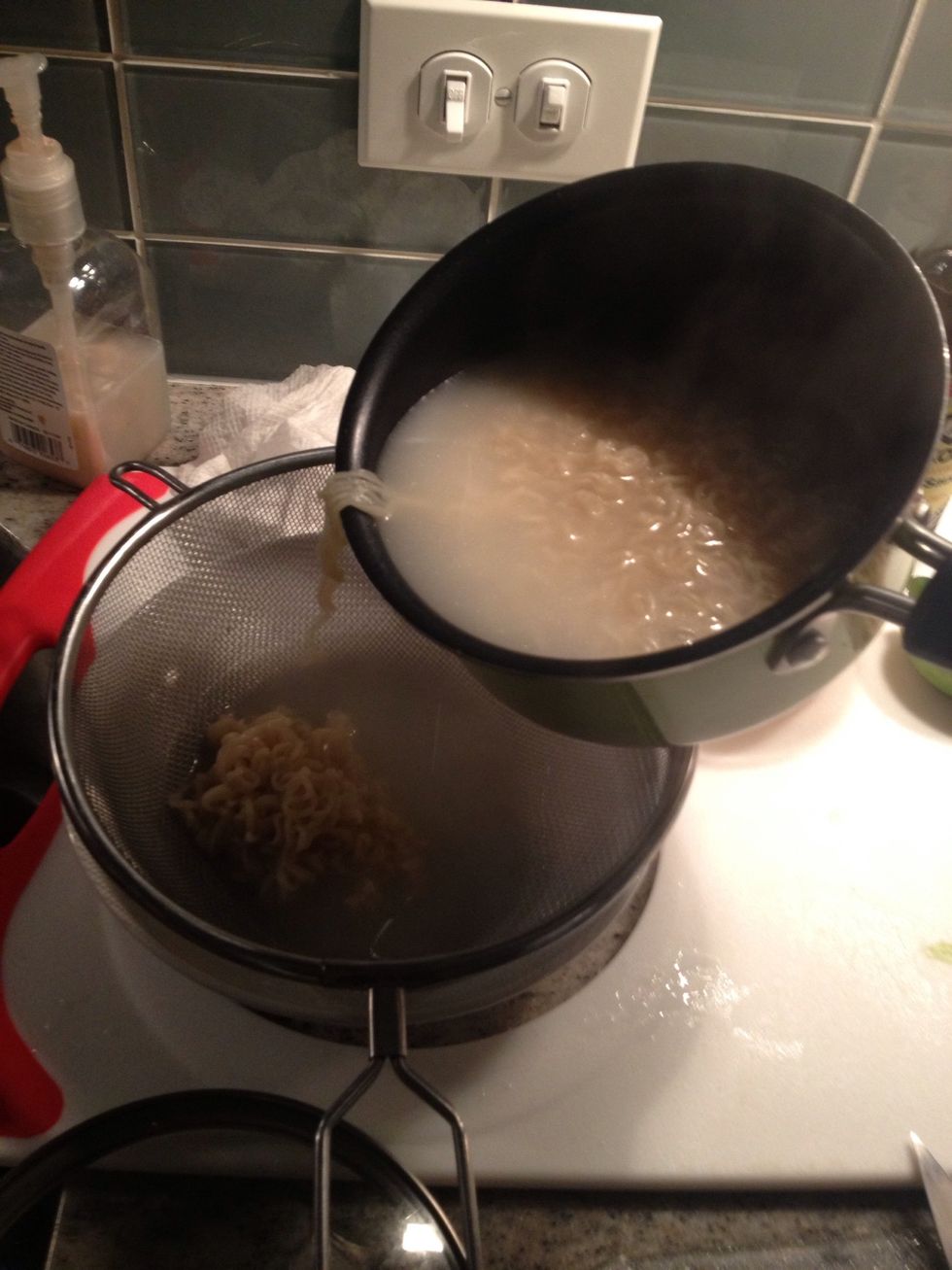 Strain the noodles and reserve the cooking liquid (about 1 1/2 cups)