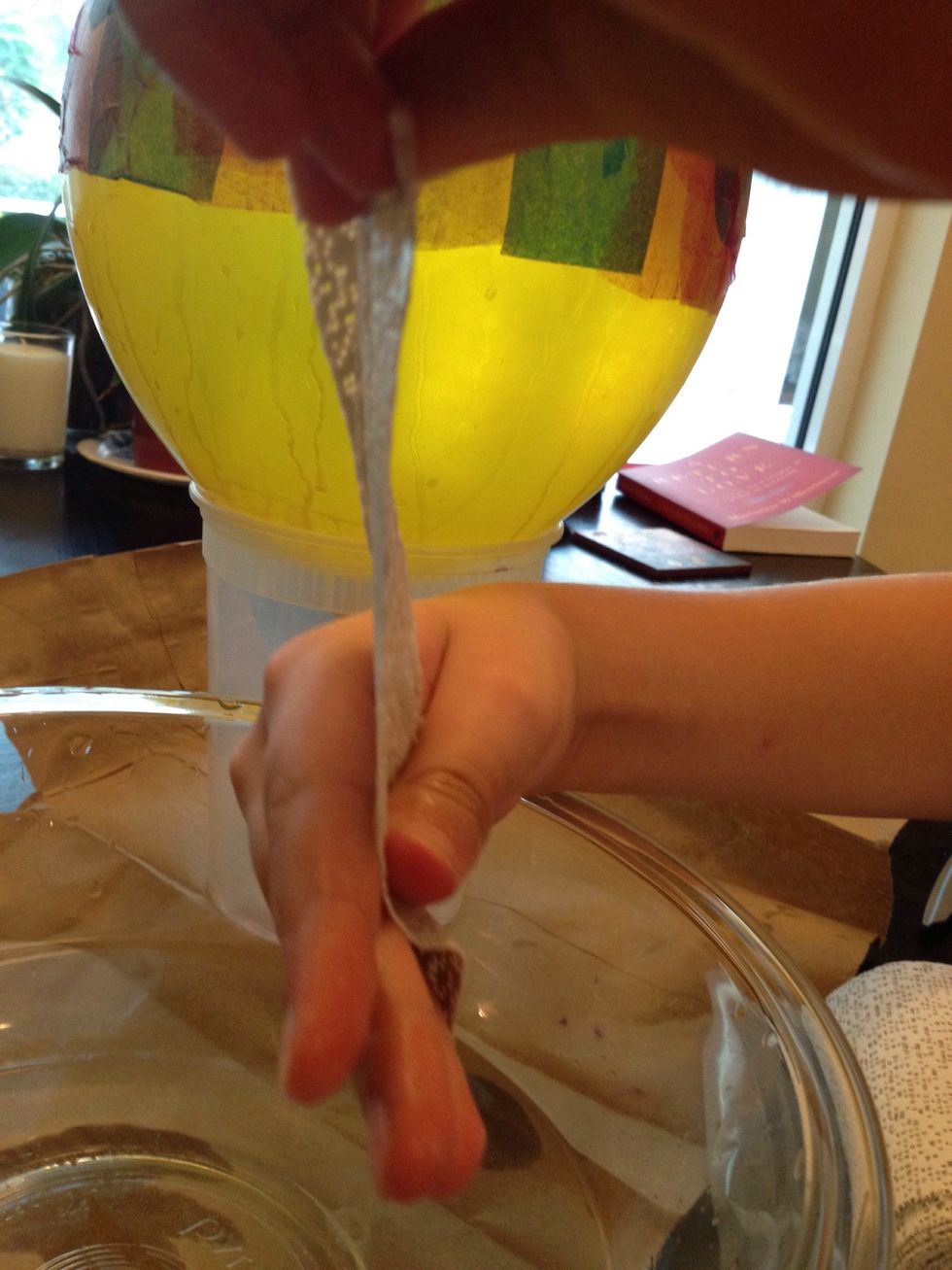 Strain water from the plaster strips.