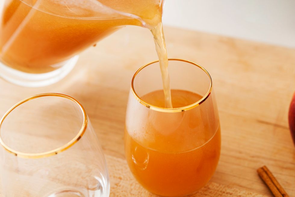 Strain your cider and pour into glasses.