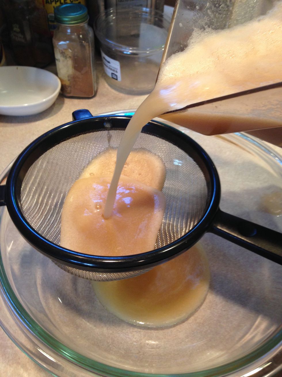Strain your juice in a fine mesh strainer over a glass bowl. You may need to stir it around with a spoon in the strainer to get it going.