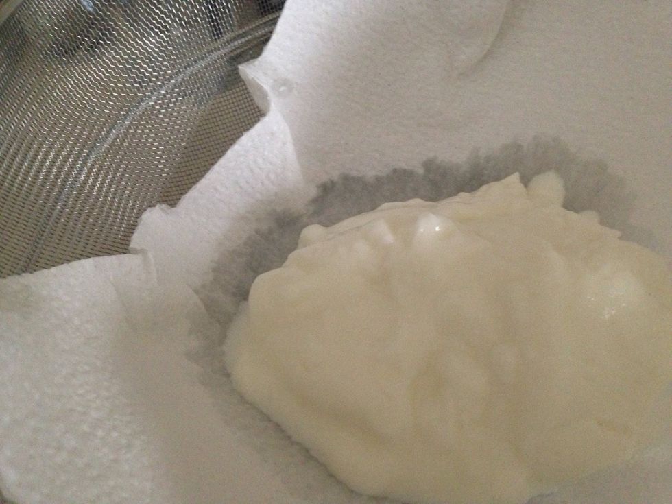 Strain your yogurt (I used lowfat plain, but any fat variety will work). A cheesecloth is helpful, but I used a mesh sieve w paper towels over a bowl. Let this sit in the fridge for an hour.