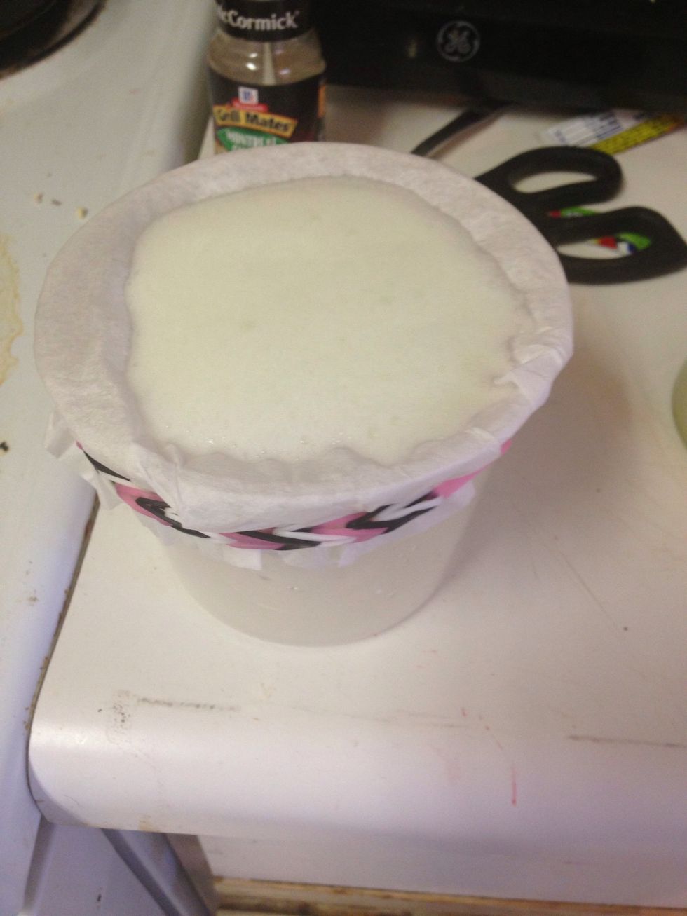 Straining the solids from the juice