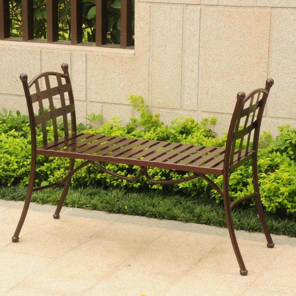 Strategically placed outdoor and metal stool will call for the visitors as well as the household members to sit for some time in the front yard.