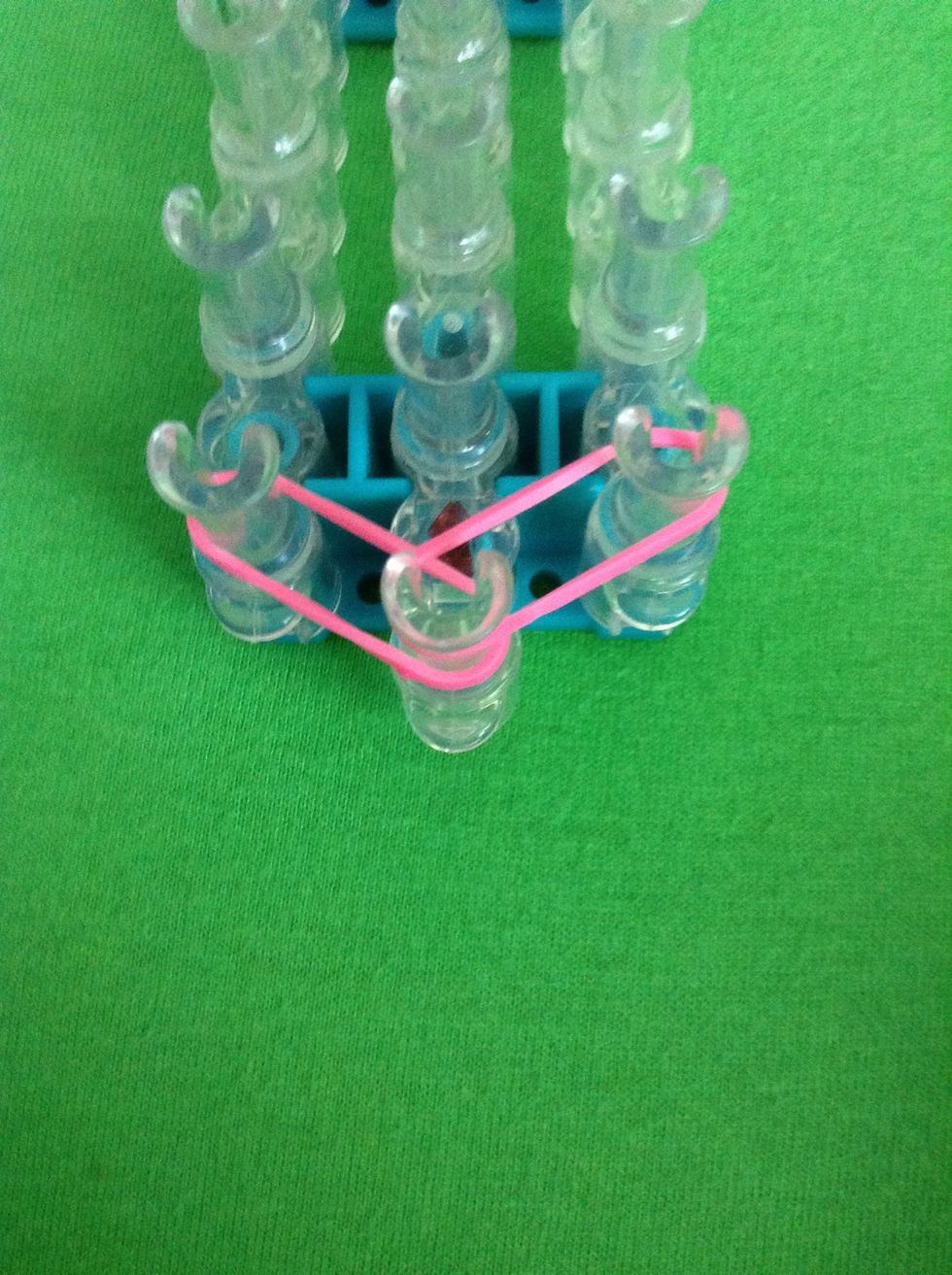 Stretch a rubber band from the middle to the right side