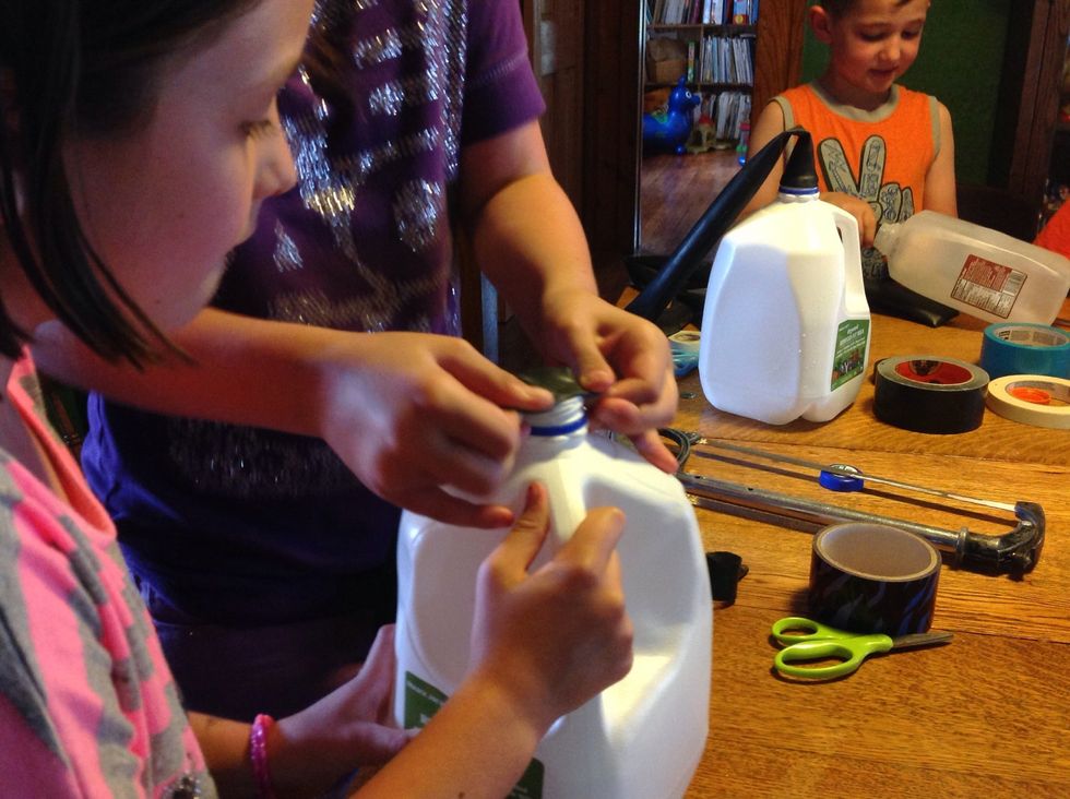 Stretch inner tubes over the top of the bottle