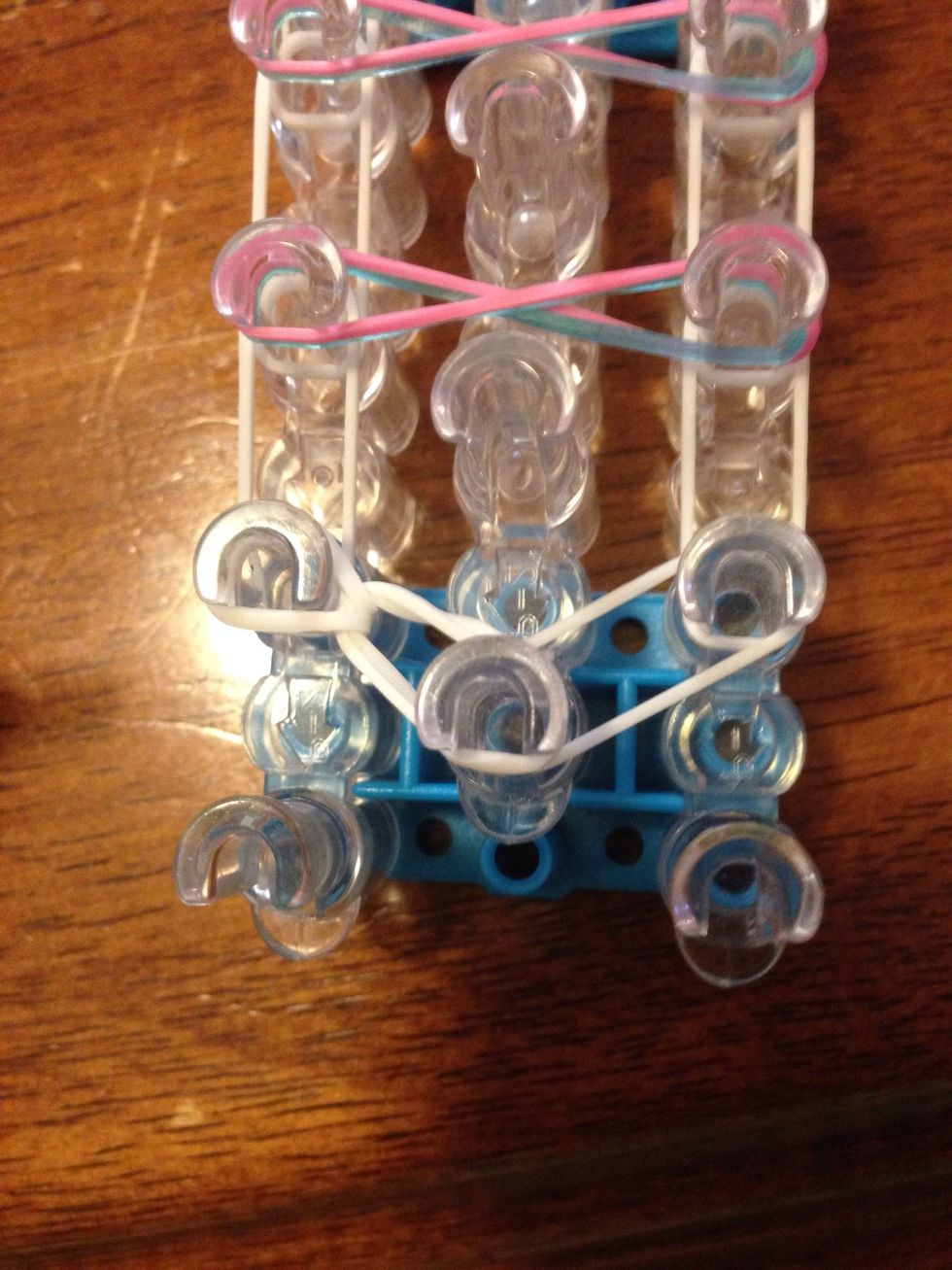 Stretch it to the first left pin. **THIS IS JUST LIKE A SINGLE**