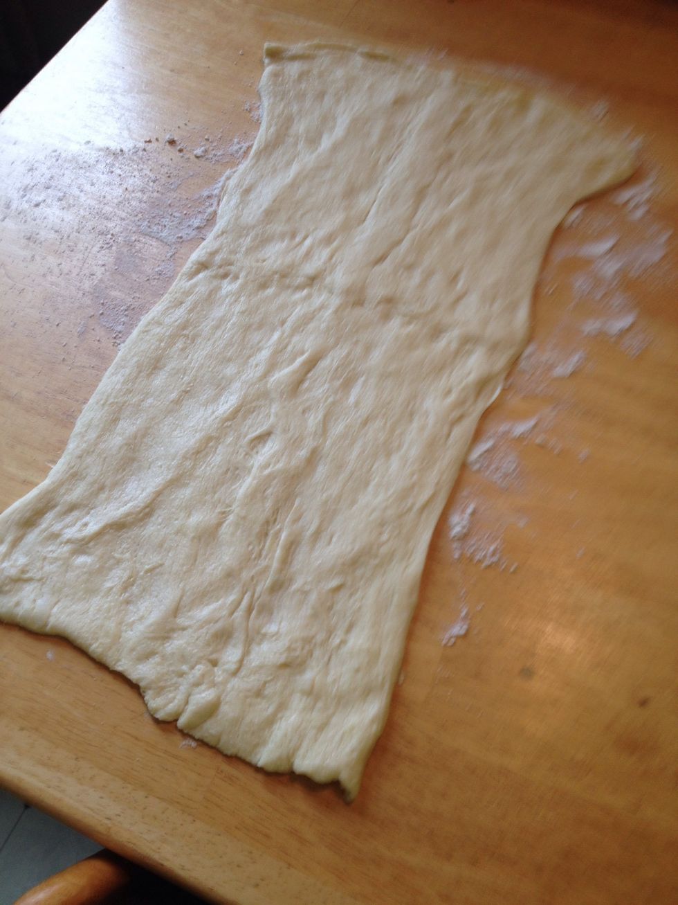 Stretch out the crescent rolls.