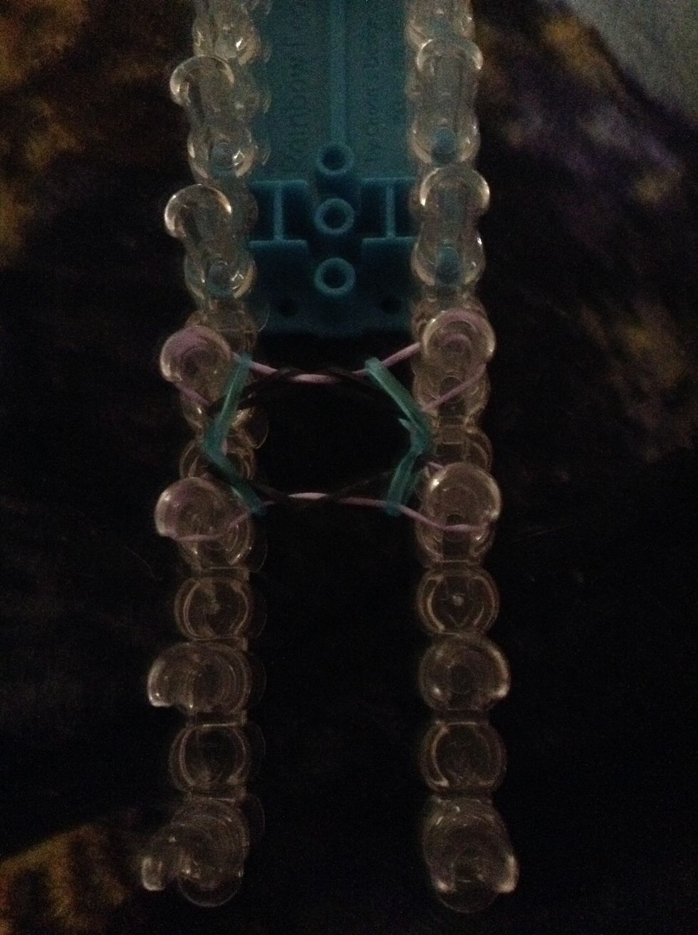 Stretch the figure eights over the top band and you should have this (repeat until you have it big enough. (If your doing a pattern make the top band your next color.)