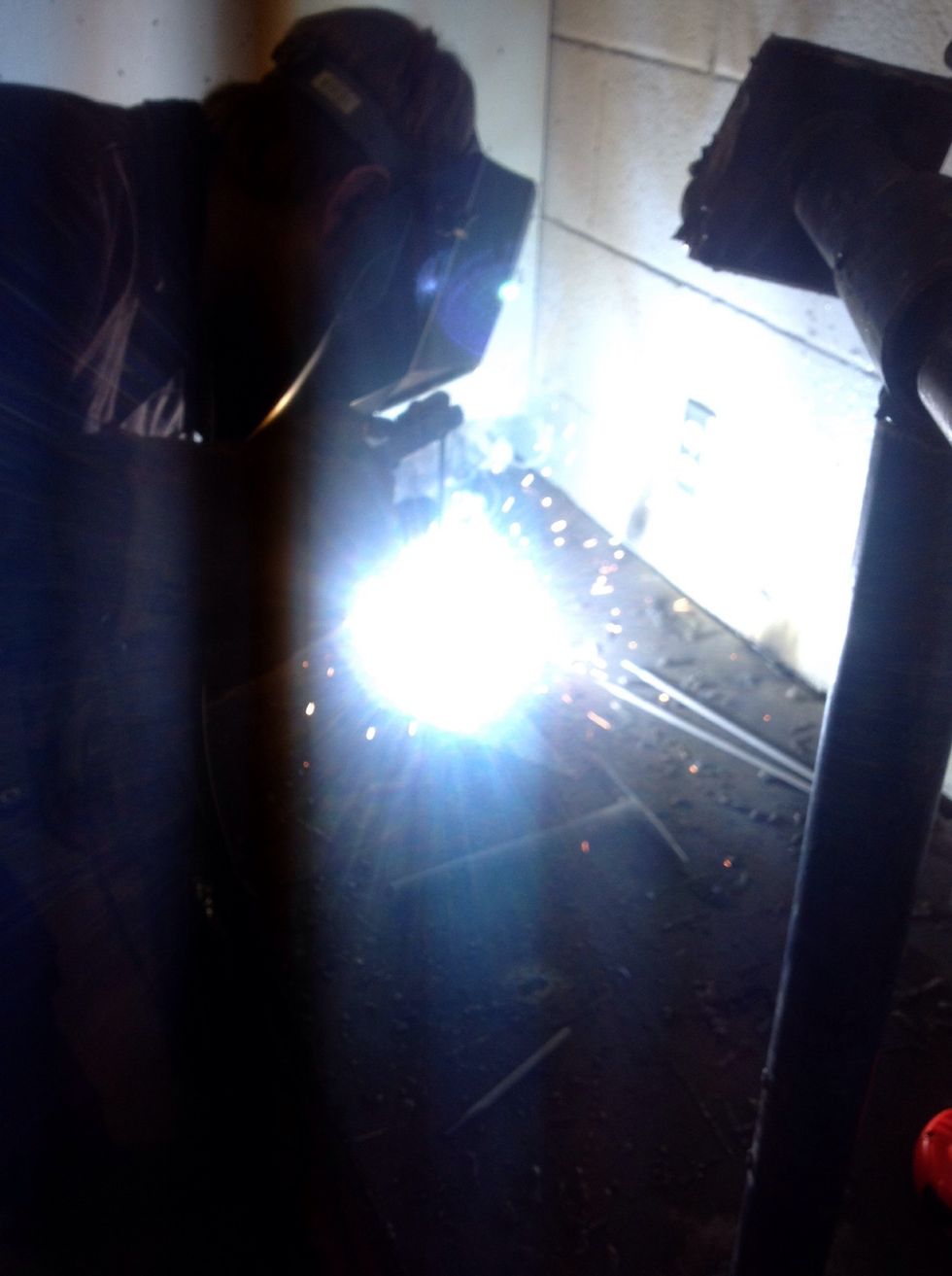 Strike an arc by tapping the electrode against the metal or strike it like a match. When you continually have an arc going and your puddle is building up you move forward in a pattern or strait.