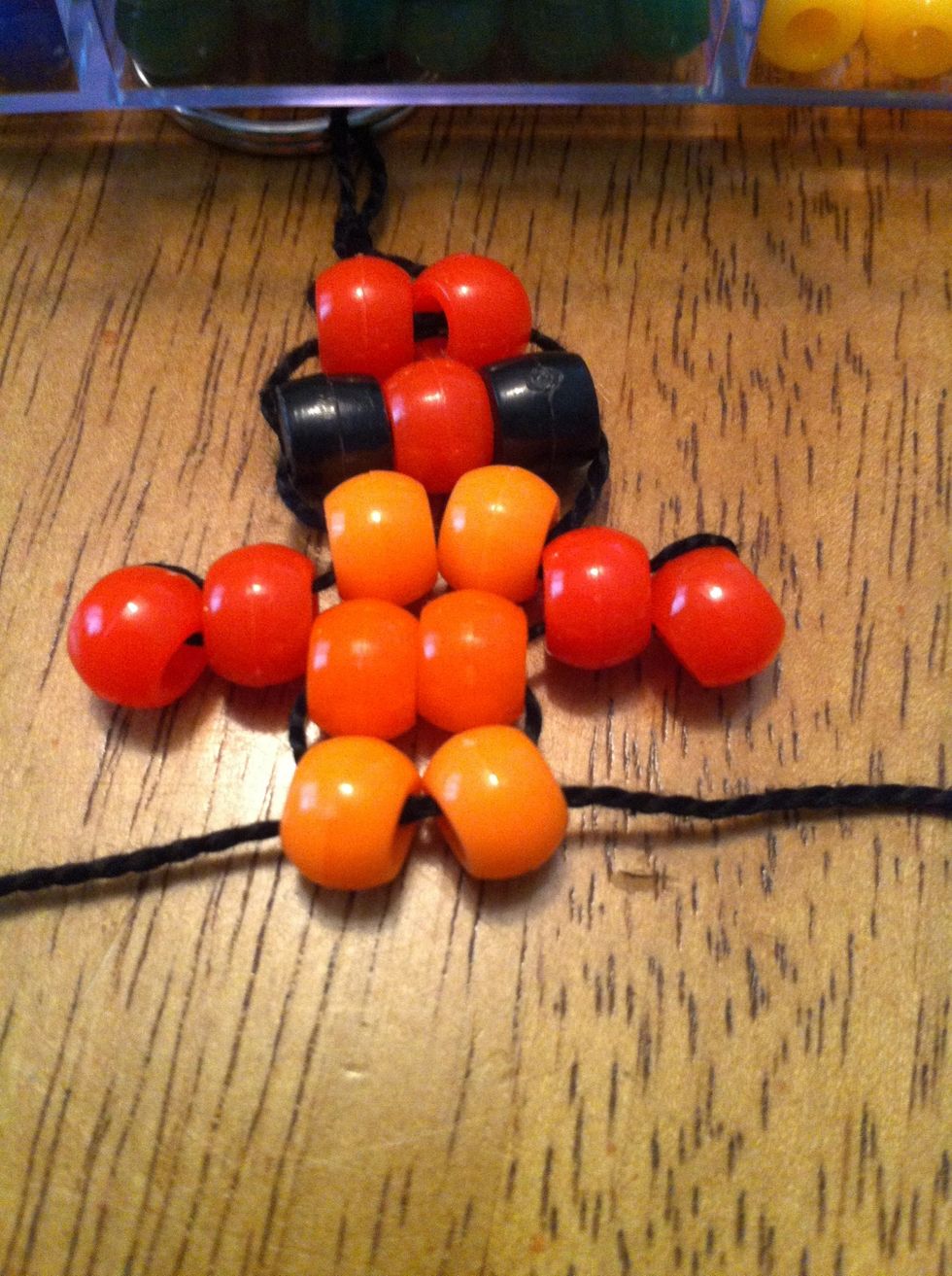 String on the rest of the beads/body with the same method as step 7-14.