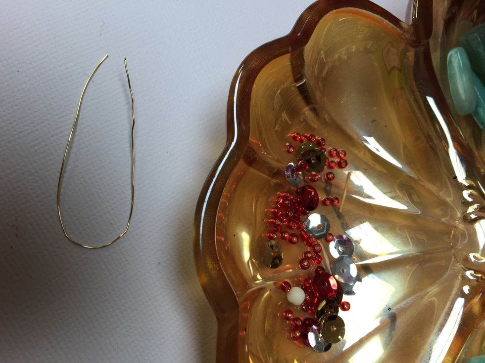 String some glass beads on wire for your hanger