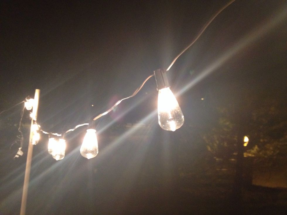 String the cafe lights from each hook