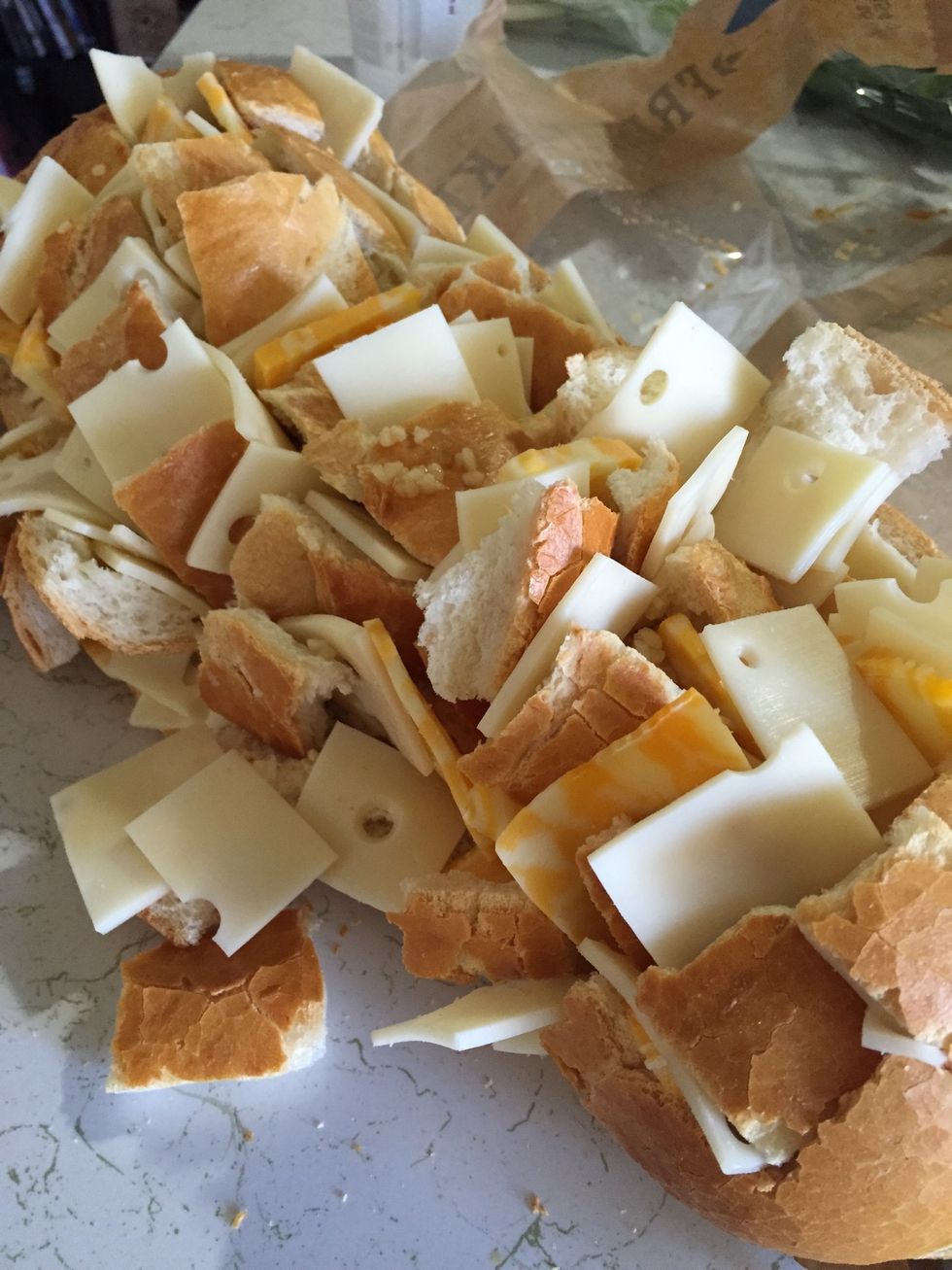 Stuck the cheese between cut line. Don't worry if it look messy caused it will be delicious \ud83d\ude1c baked at 350F for 17-20 min.