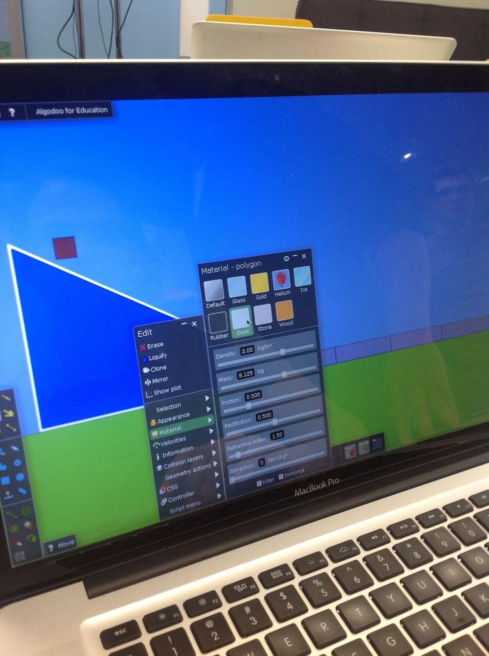 Student select different materials to slide the cube down the slide. They can select different materials for the cube, the slide, and the bottom segments of the platform.