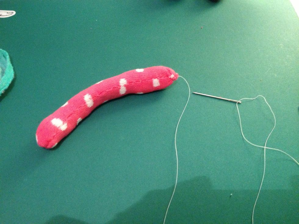 Stuff and sew the top of the arms up.