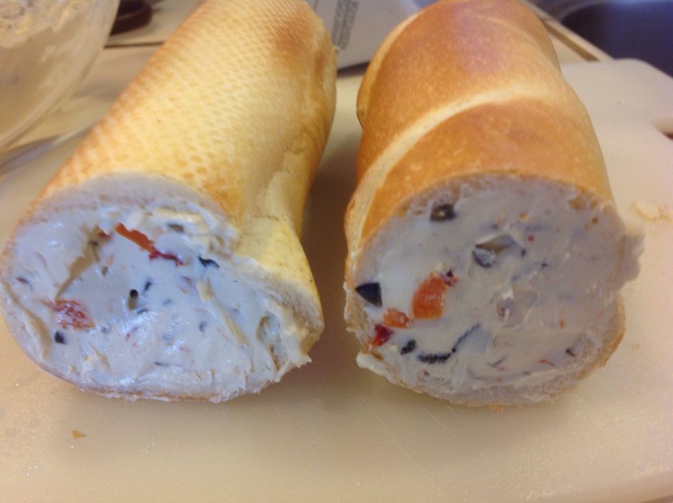 Stuff baguettes with cream cheese. I used a butter knife to stuff the halves with the cream cheese mixture. You want to pack it solid.