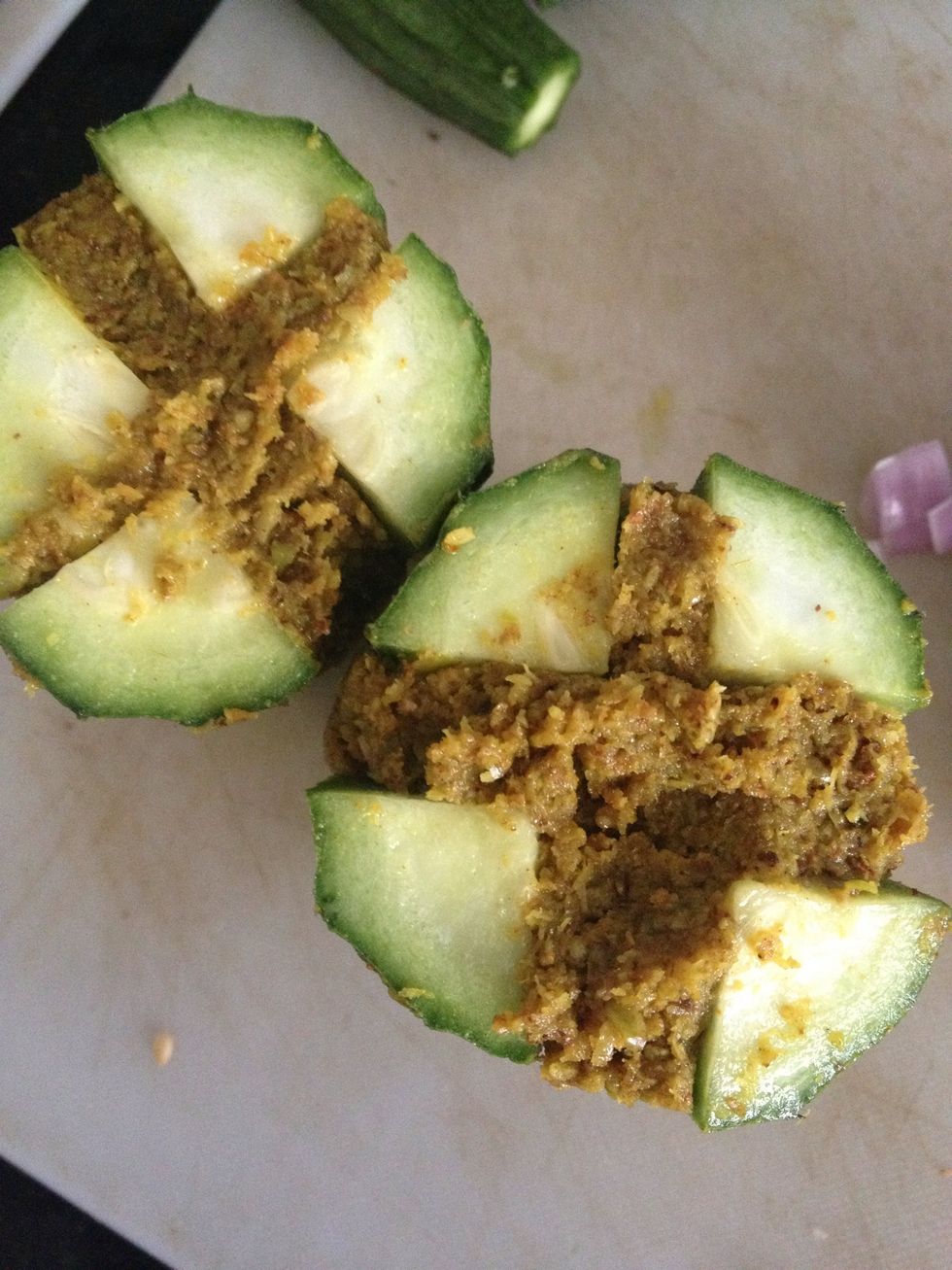 Stuff the gourd with the paste as shown