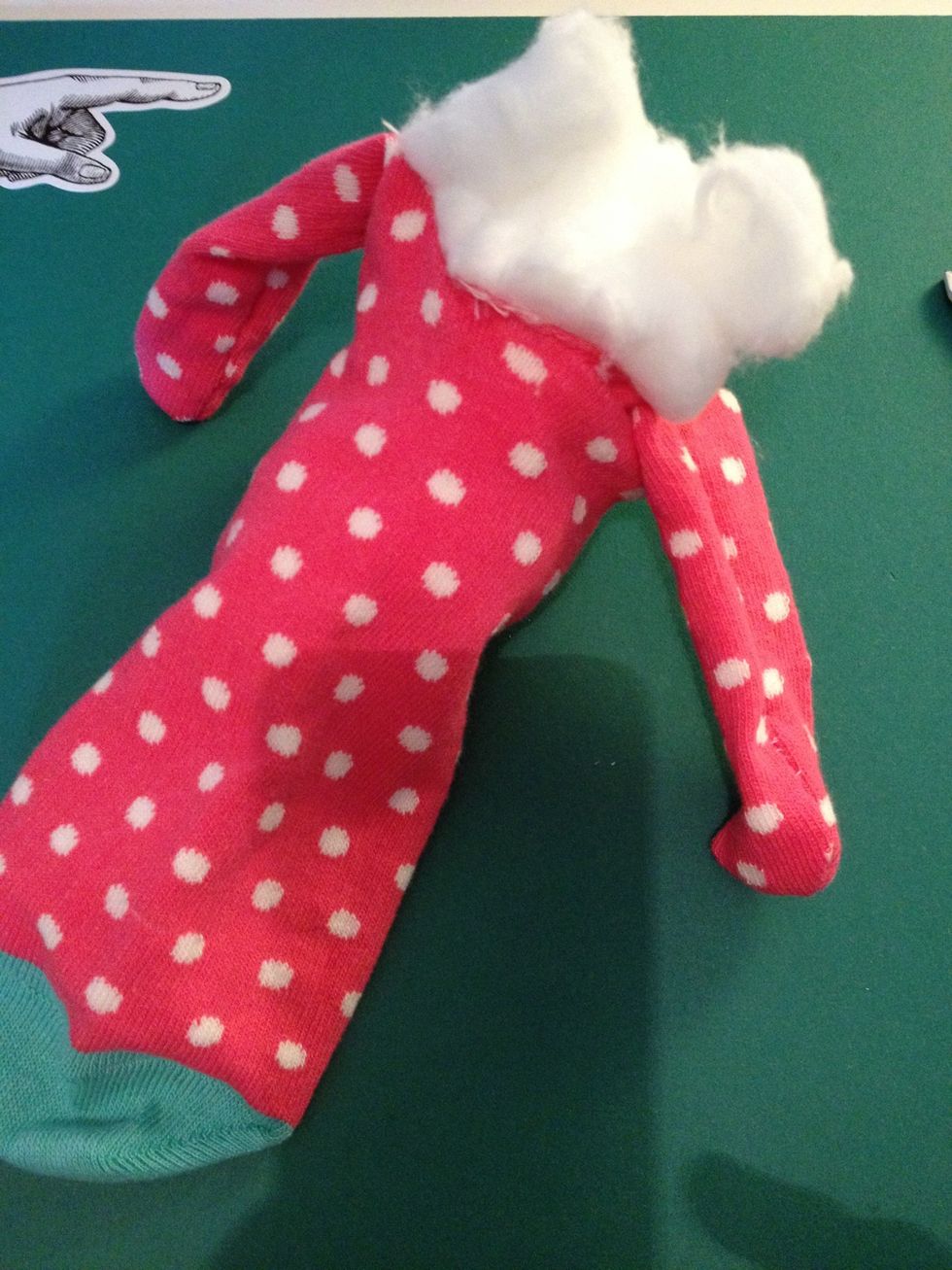 Stuff the monkey through the base.