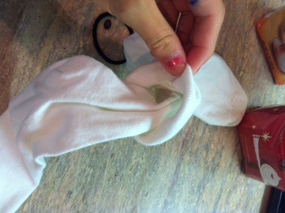 Stuff the other sock down inside the first