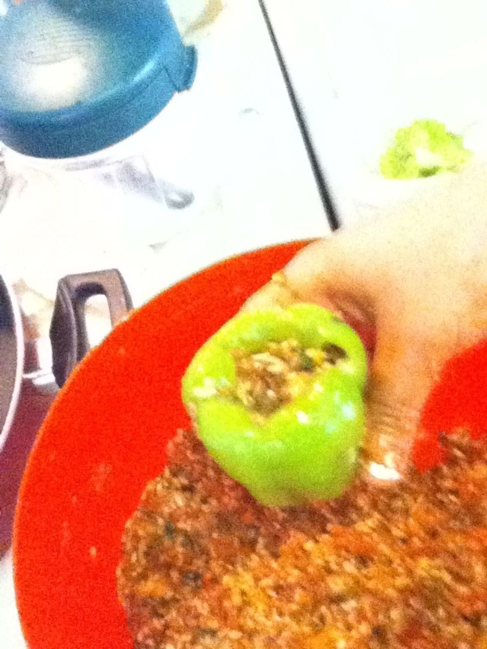 Stuff the peppers ( remember to taste the filling before for taste)