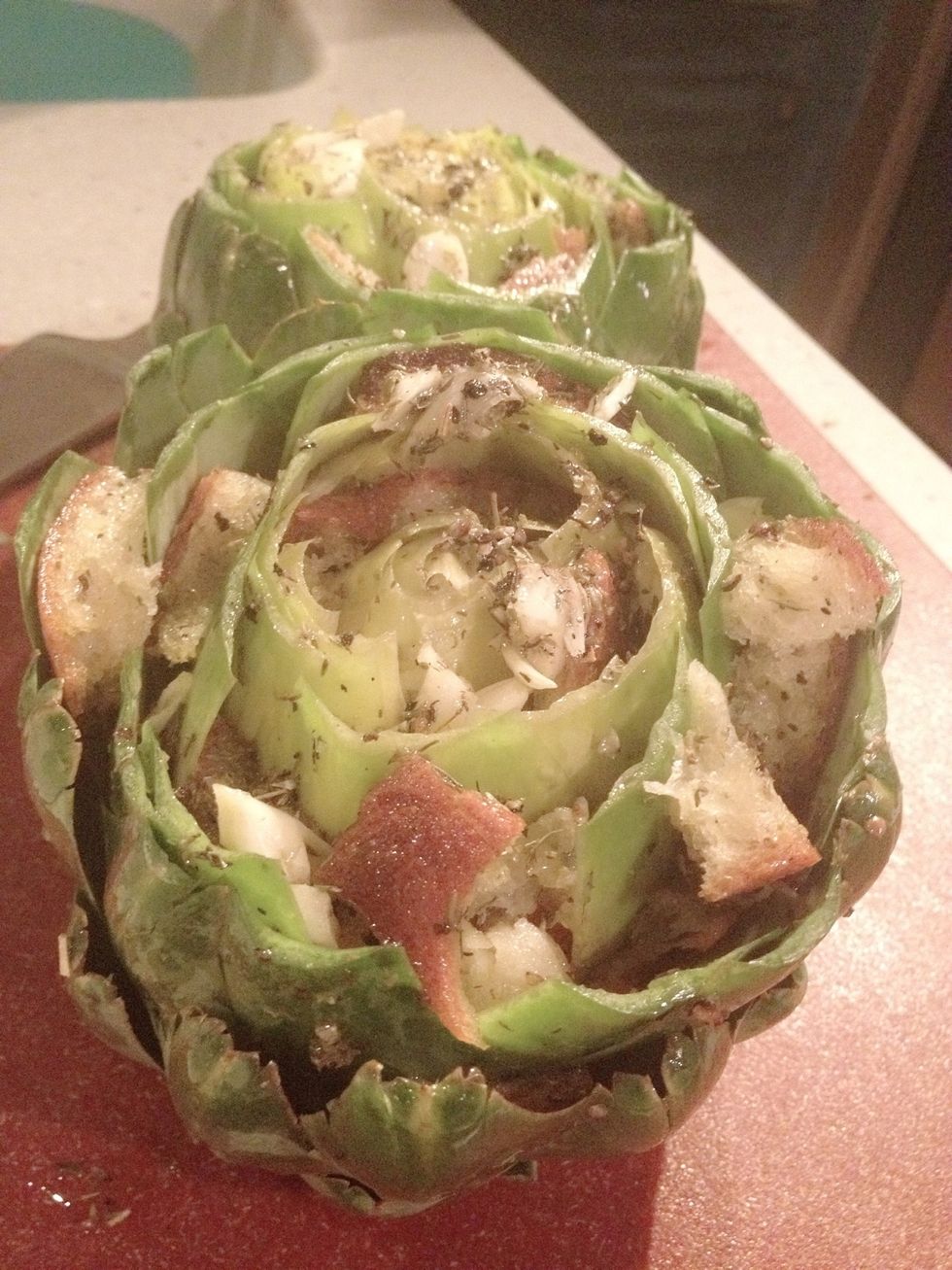 Stuff the soaked bread mixture in between the leaves.