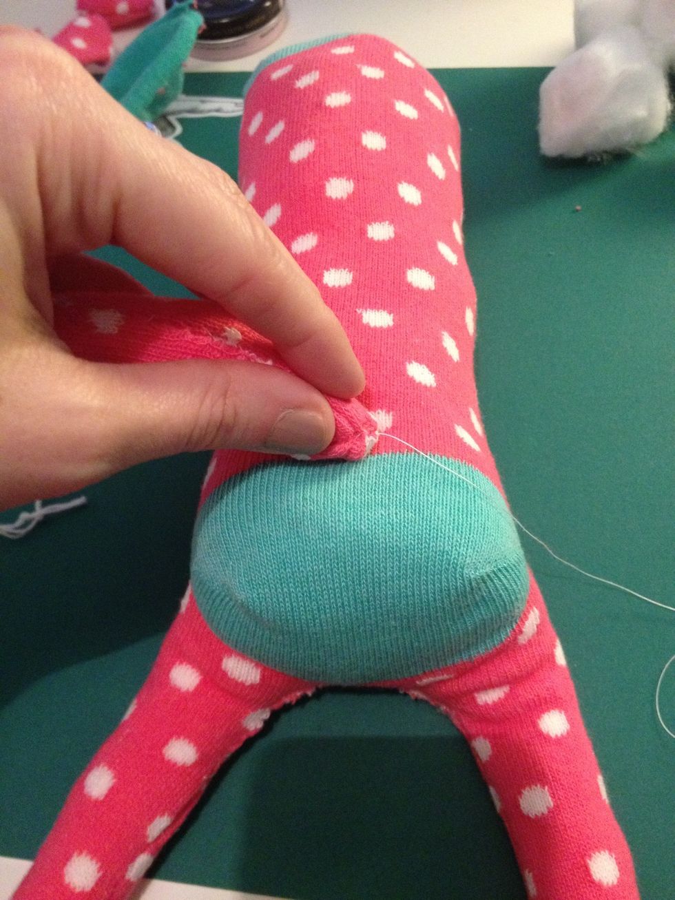 Stuff the tail and sew on to the back just above the bottom.