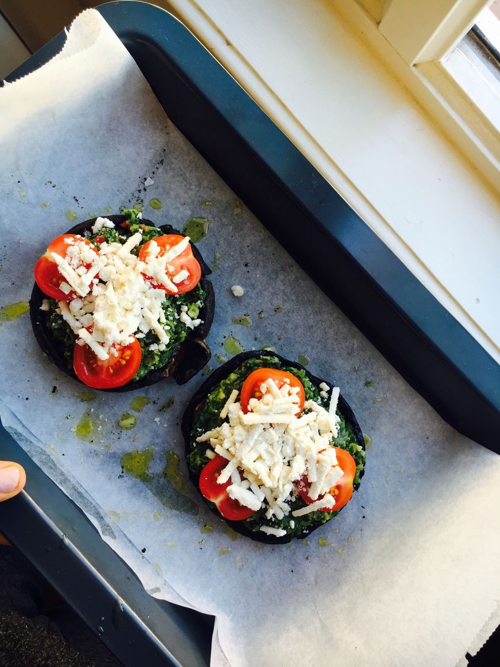 Stuff with the spinach mix. Add tomatoes + 1 tbs of shredded tofutti on top each mushroom