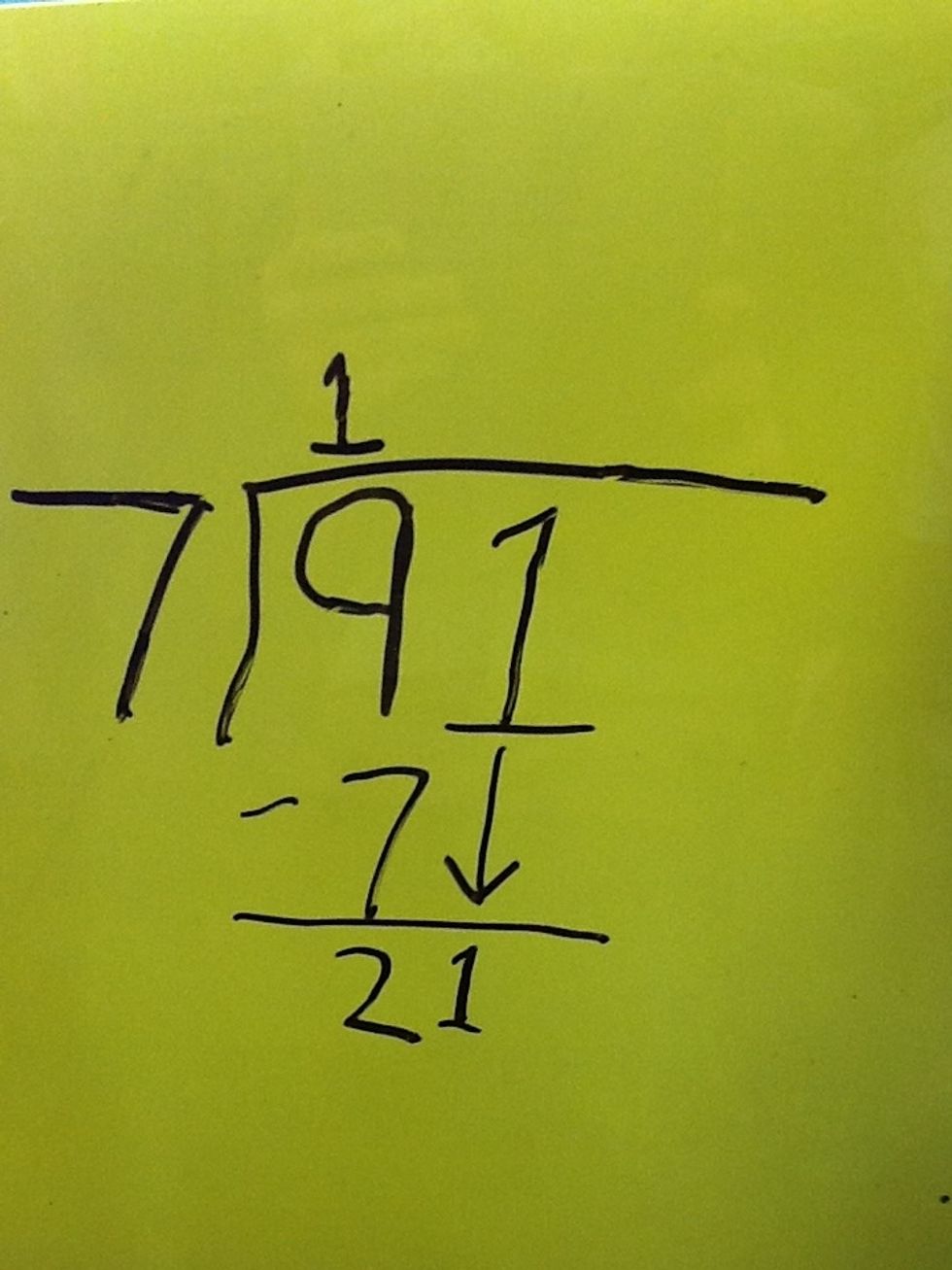 Subtract 7 from 9 to get two, bring down the 1 so you have 21 below the 7.