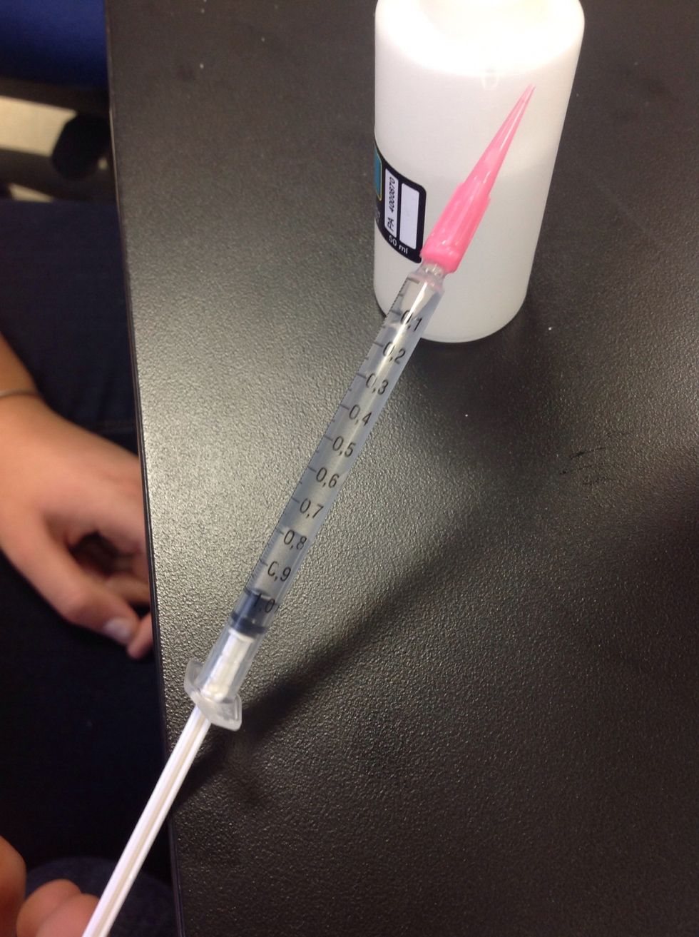 Suck up the Mg-3 liquid until the plunger is at the 1mL line. There will be some air, this is okay.