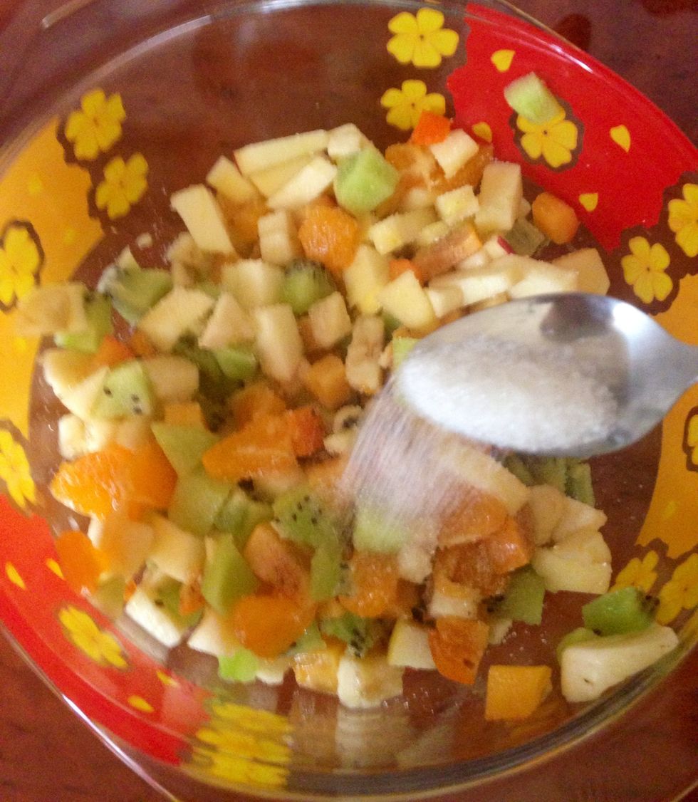 Sugar, mix everything thoroughly and put in the fridge for about 30 m