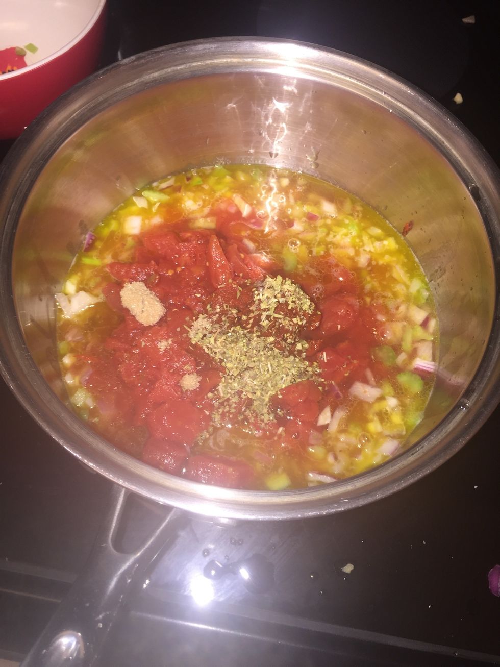 Sugar, oregano, and water and season with salt and pepper. increase the heat to medium and bring to a boil then reduce the heat and simmer stirring occasionally for 15 to 20 minutes until thickened.